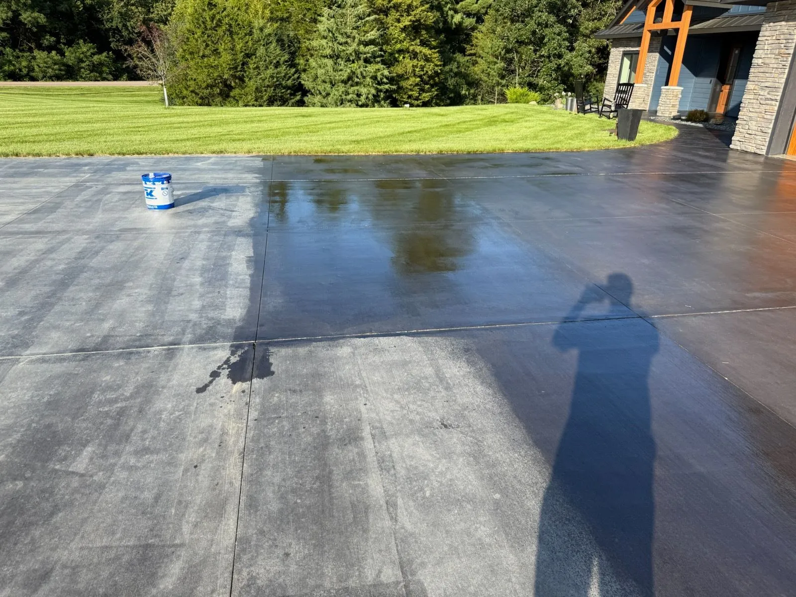 Sealed concrete driveway with wet finish