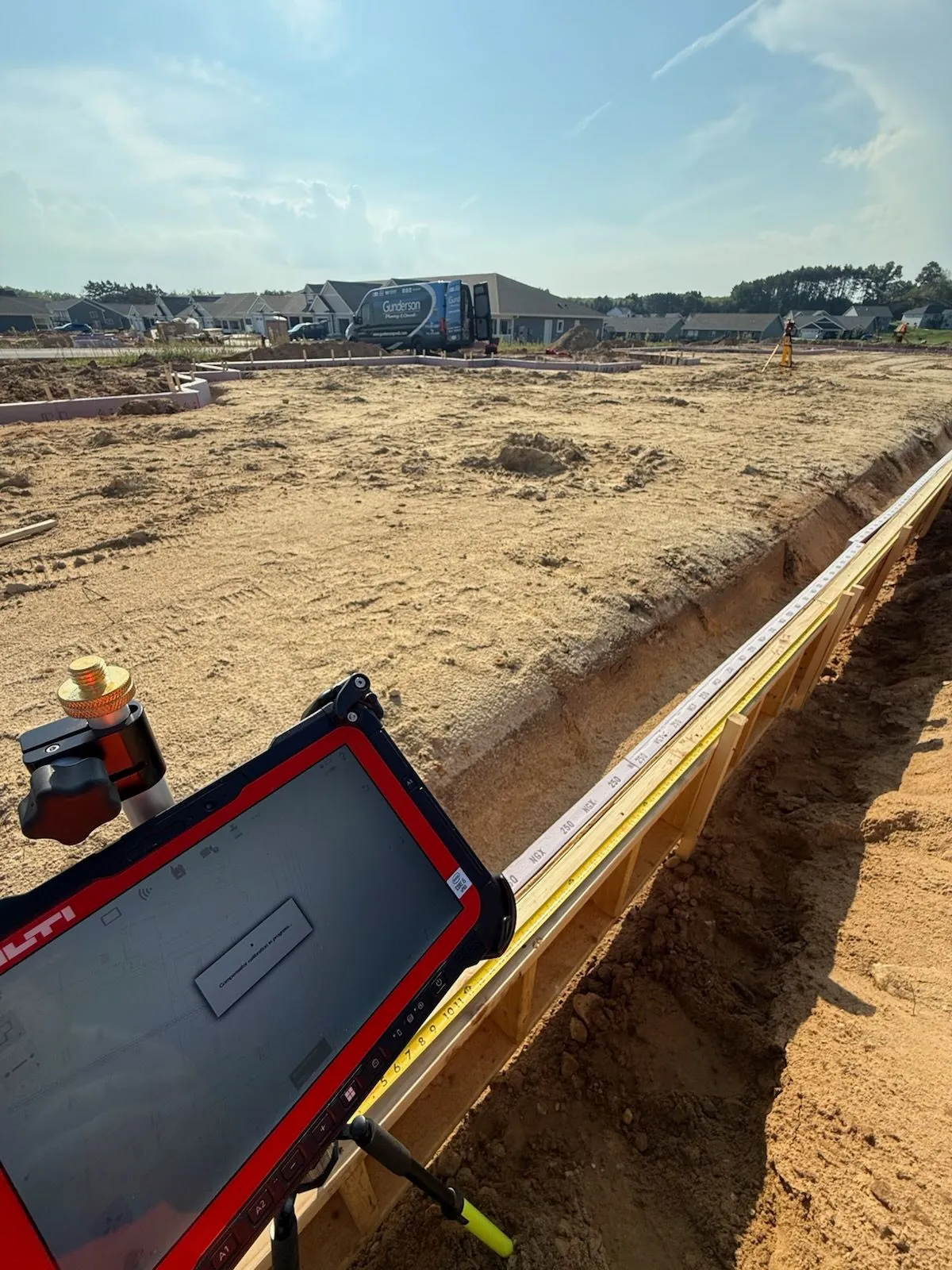 Foundation layout with Hilti tablet and string line