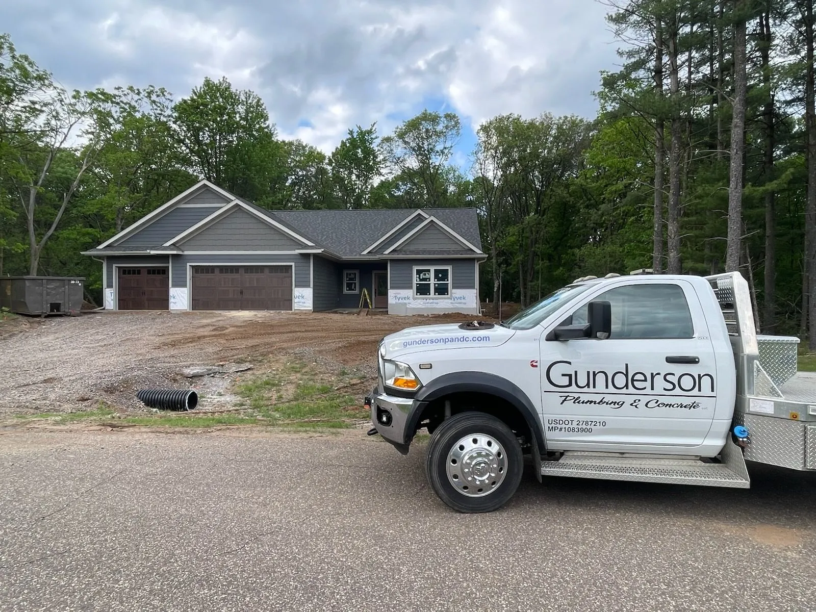 Gunderson flatbed truck at new home build